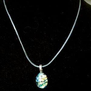 Opal Pendant on leather chain.
